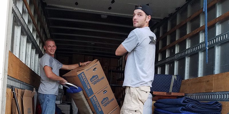 Two Mover guys doing their work